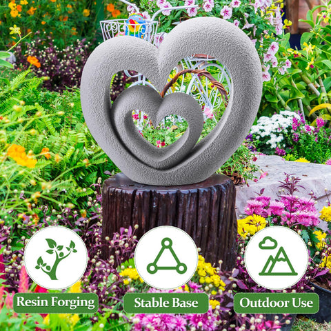 Suzile Nesting Heart Garden Statue in sunlight, adds warmth and contemporary charm to outdoor spaces.