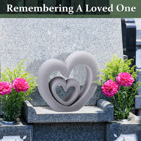 Suzile Nesting Heart Garden Statue texture in gray resin, authentic stone-like appearance.