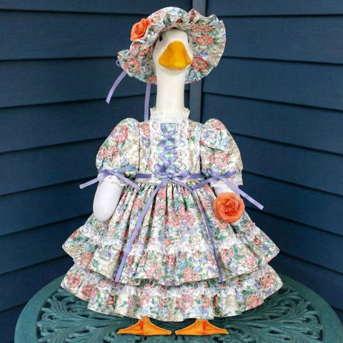 Suzile porch goose outfit set with spring flower dress enhances seasonal lawn decor.
