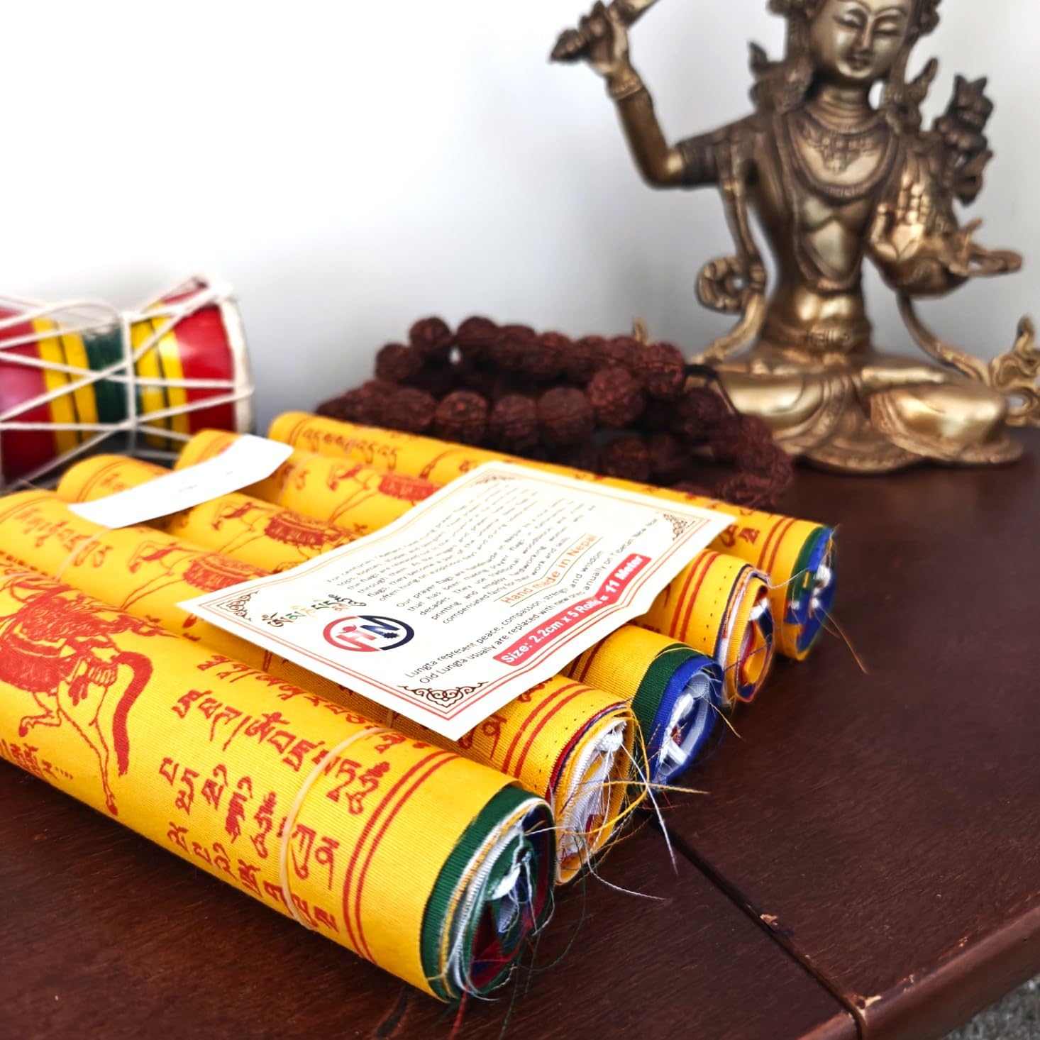 The Swayambhu indoor-outdoor decor flags offer versatile beauty for gardens and studios.