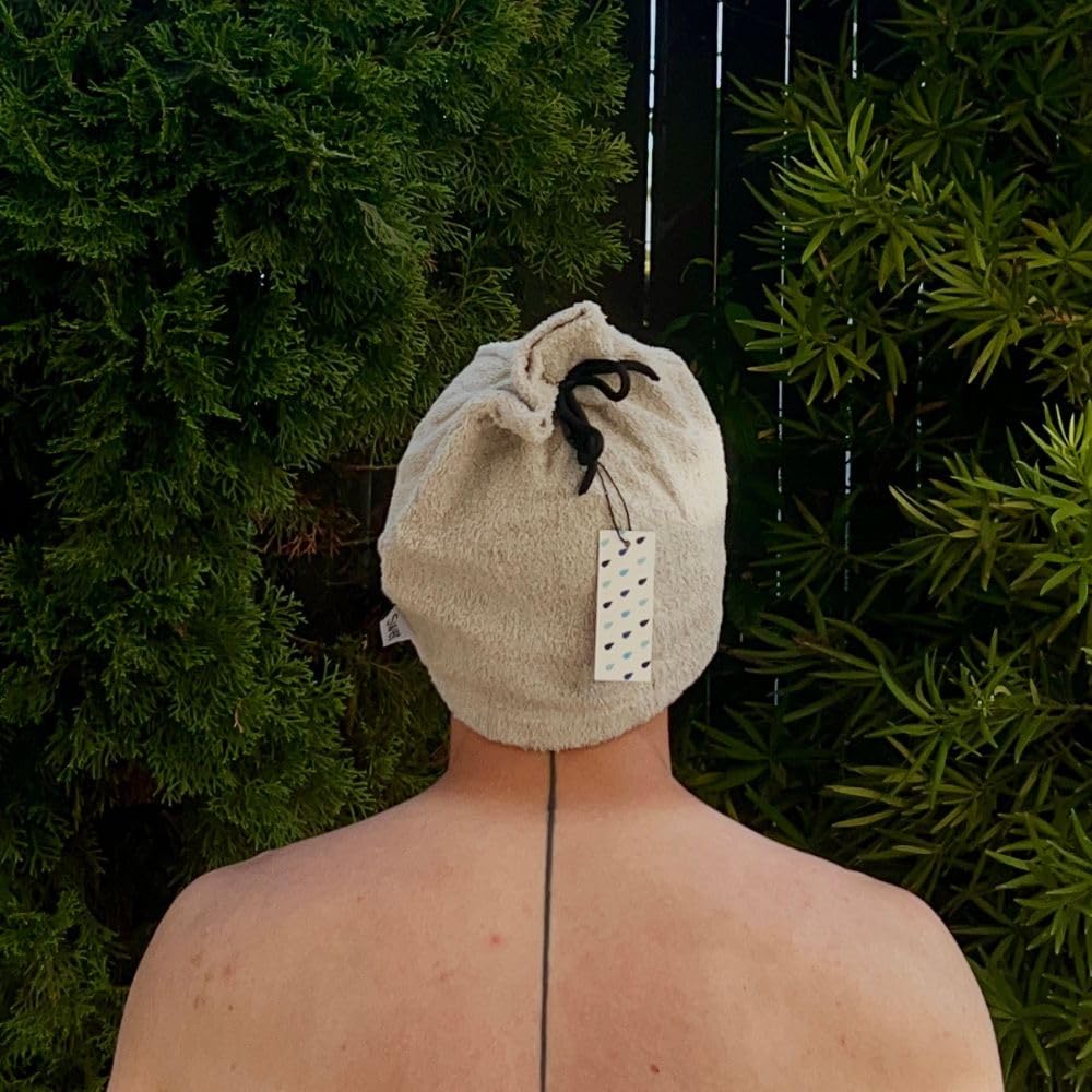 Swet Sauna Hat versatile design doubles as a towel and cooling accessory.
