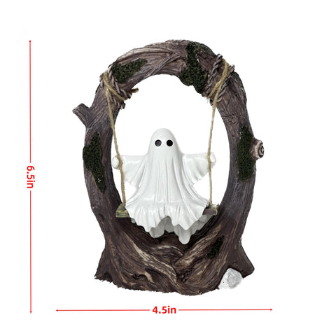 T Starlight Bright Q ghost figurine on desk adds gothic whimsy to your workspace.