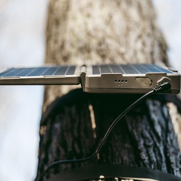 Panel compatible with REVEAL and DEFEND cameras for versatile charging.