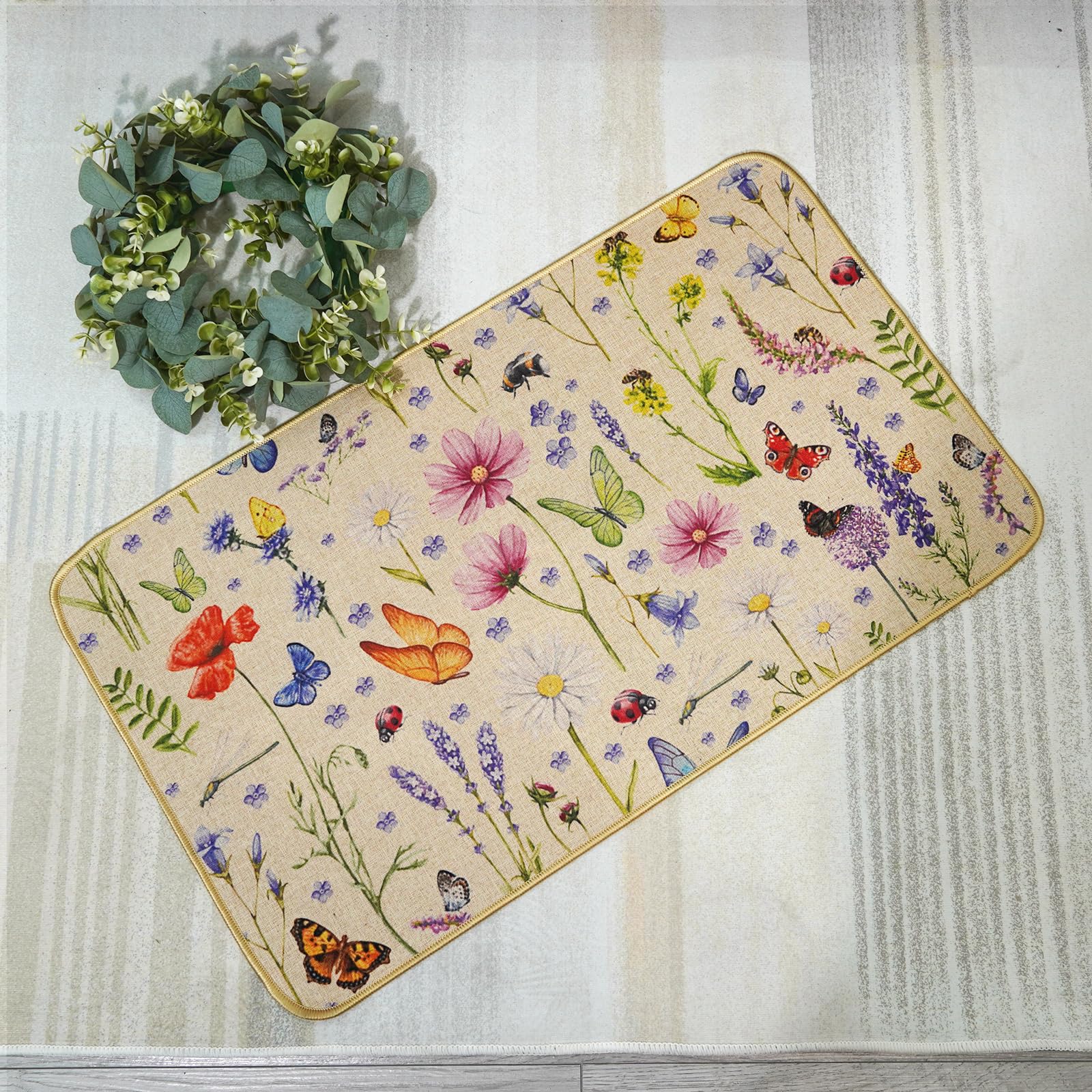 TAJWE floral front mat invites spring vibes at porches and kitchens.