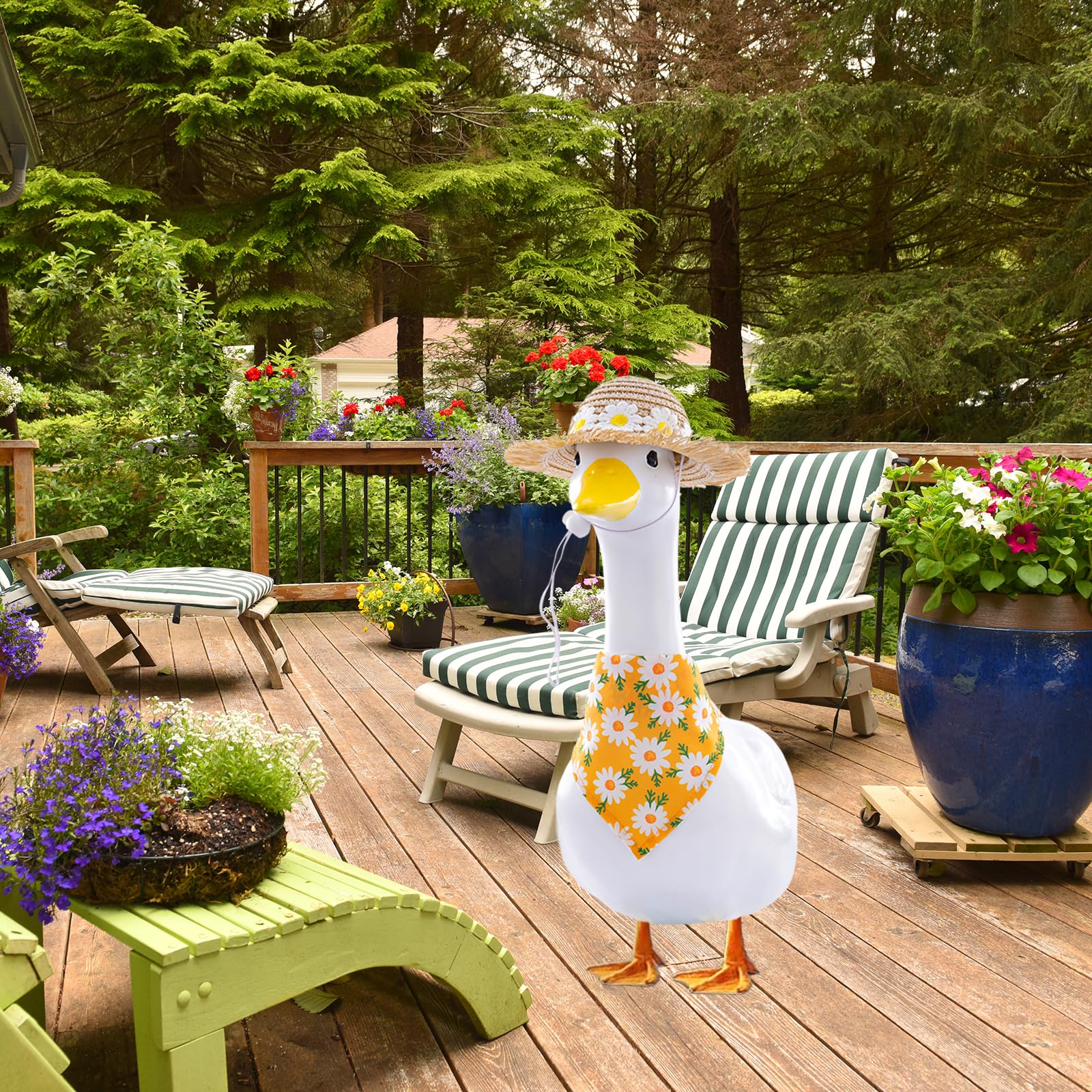 TAKEALOOKO porch goose statue dressed in daisy outfit for festive curb appeal.