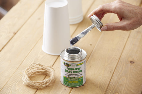 Tanglefoot Tangle-Trap surface coating traps ants, flies, and beetles effectively.
