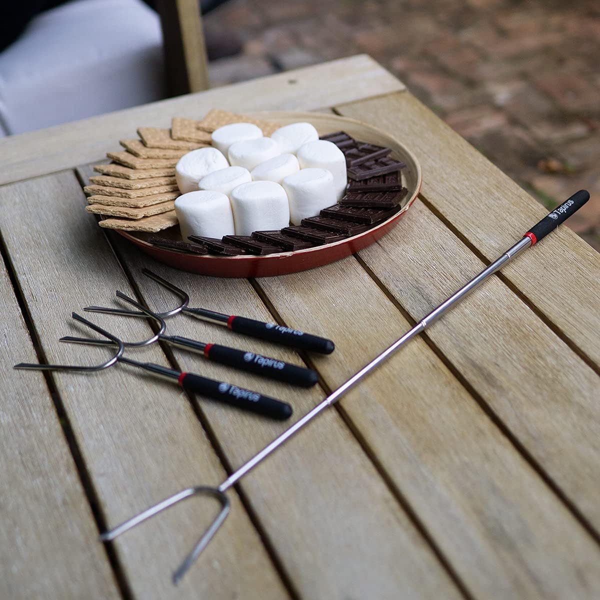 Tapirus stainless steel skewers with double prongs for secure food hold.