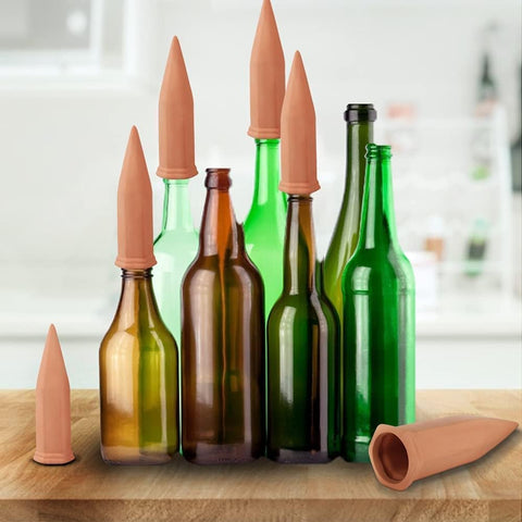 Tcamp terracotta spike paired with wine bottle for easy, clean self-watering