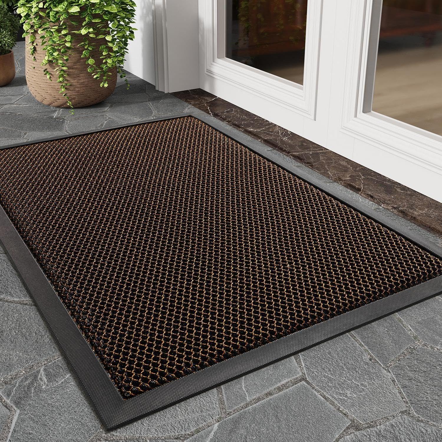 Tchdio front door mat dirt-trapper 17x29 captures dirt and moisture at the entry.