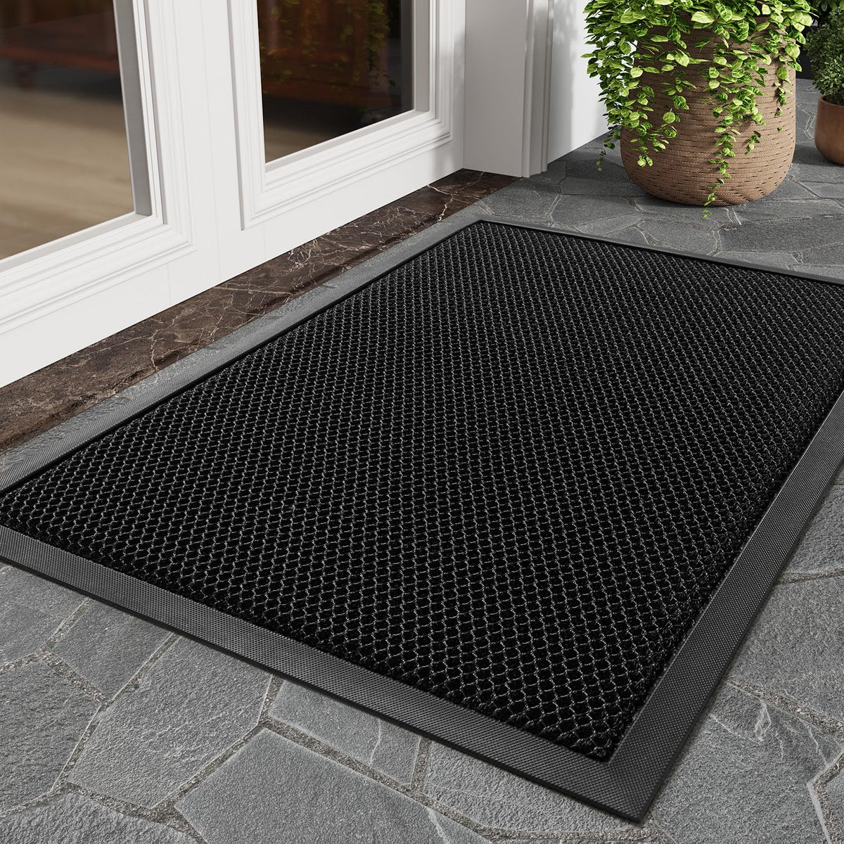 Tchdio dirt-trapping mesh surface captures dust and moisture for a cleaner entry