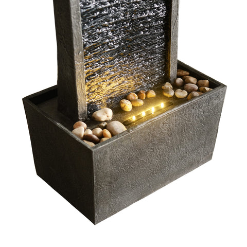 Teamson Home LED lights illuminate the fountain for magical nighttime display.