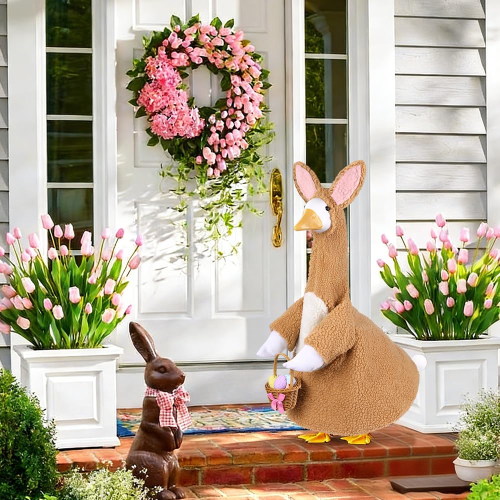 Teeanzo porch goose decor setup visible from curb, inviting seasonal smiles.