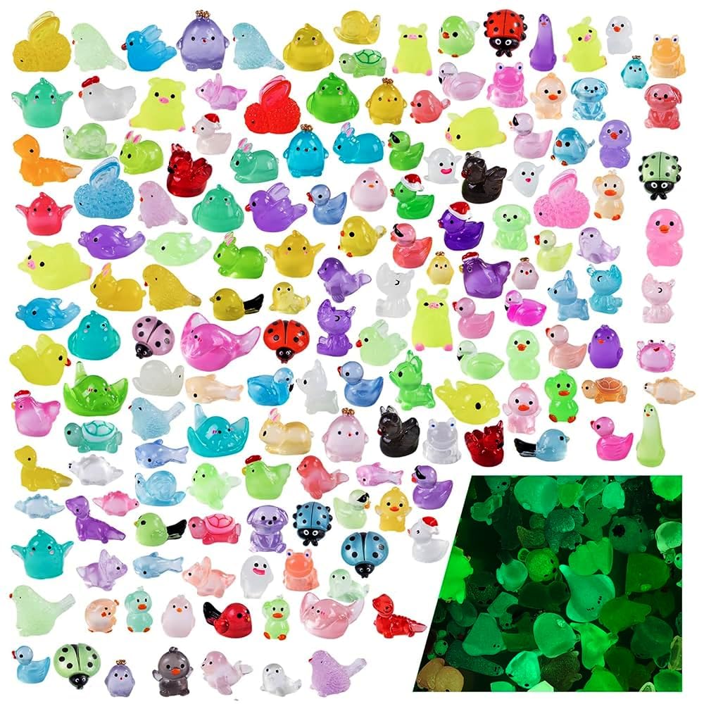 Teenzee mini resin animals glow at night for playful garden accents.