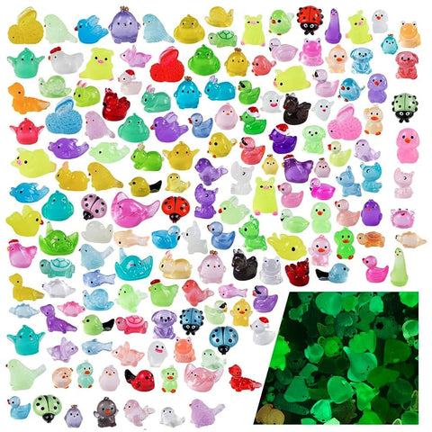 Teenzee mini resin animals glow at night for playful garden accents.