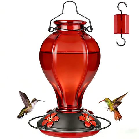 Tegarbed glass hummingbird feeder outdoors in a sunlit garden offering nectar to visitors