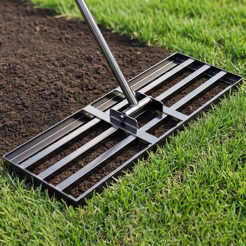 Tegarbed lawn leveling rake 30x10 inch in action for smooth soil leveling.