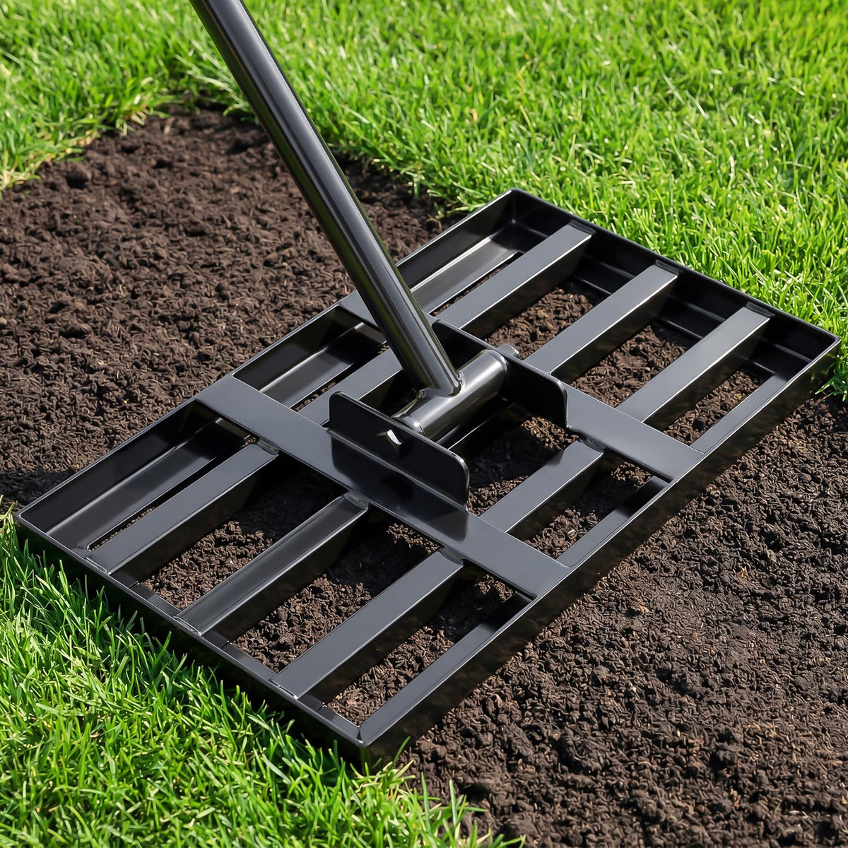 Tegarbed lawn leveling rake head for precise soil smoothing.