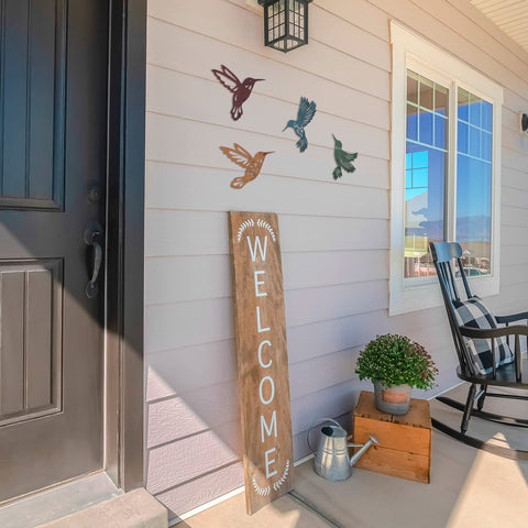Wall art includes mounting holes with screws for outdoor or indoor installation.