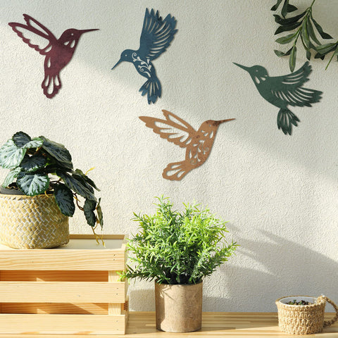 Laser-cut detailing on Teling hummingbird wall decor highlights lifelike features.