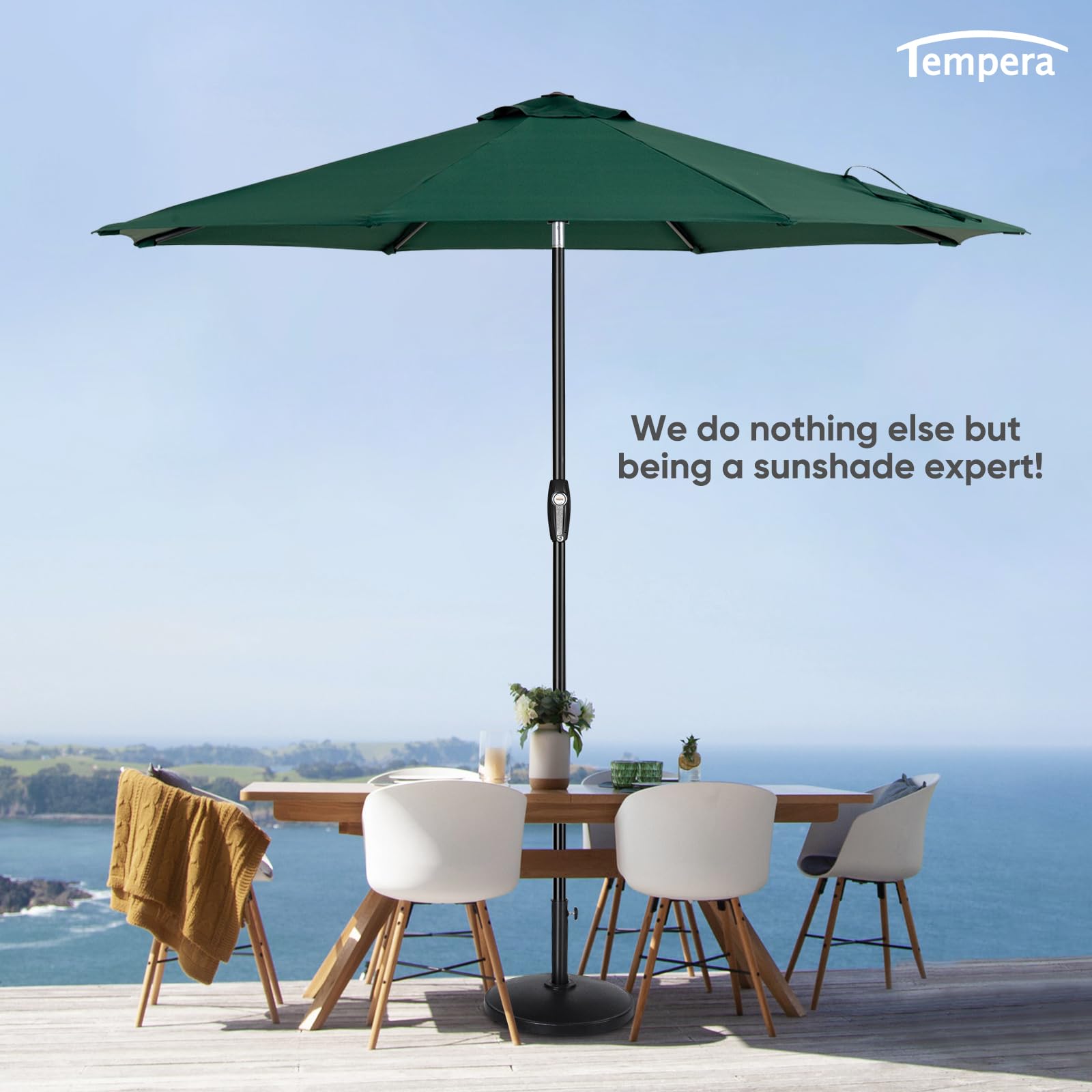 Outdoor dining setup under Tempera umbrella at garden/patio