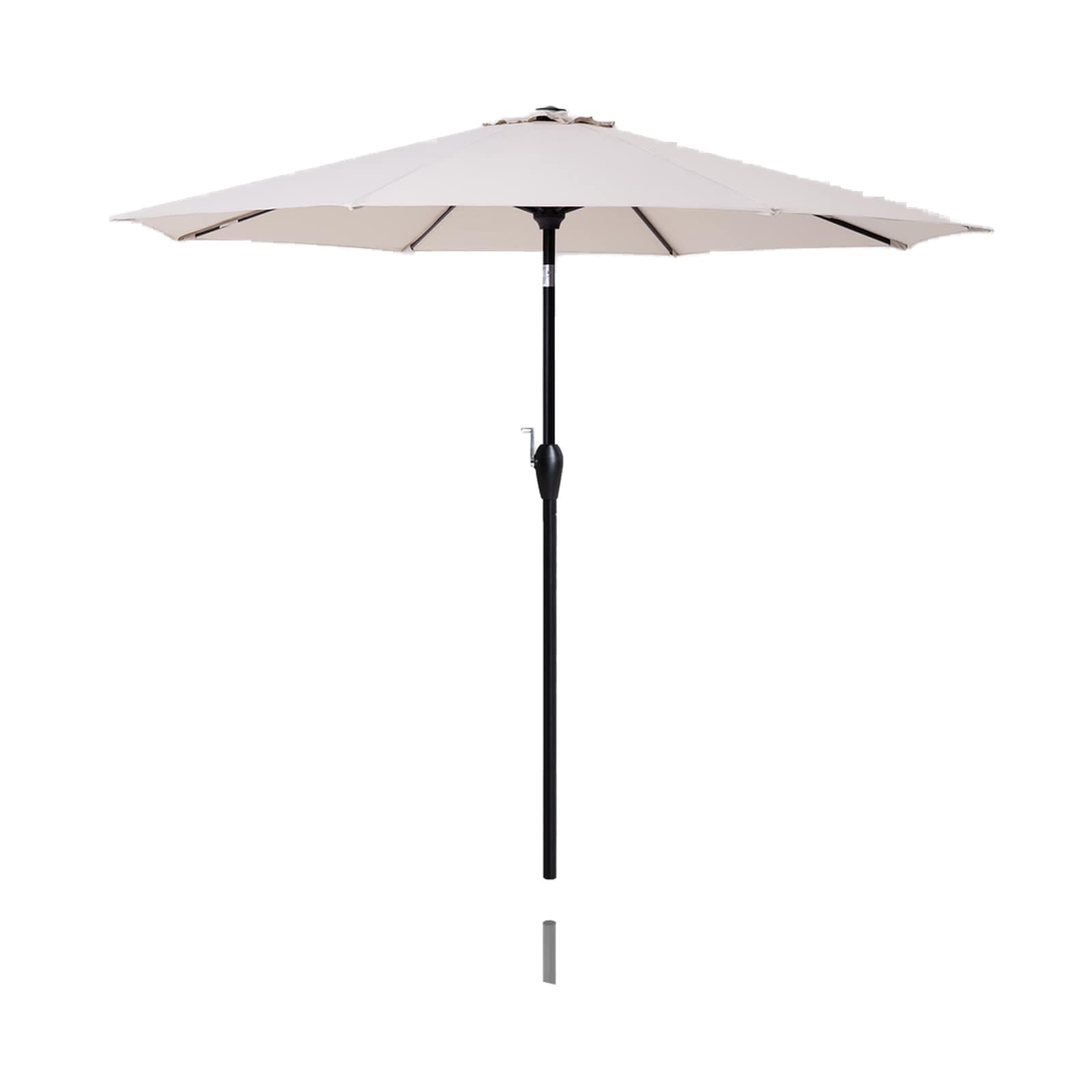 Tempera 9ft patio umbrella shading outdoor dining area.