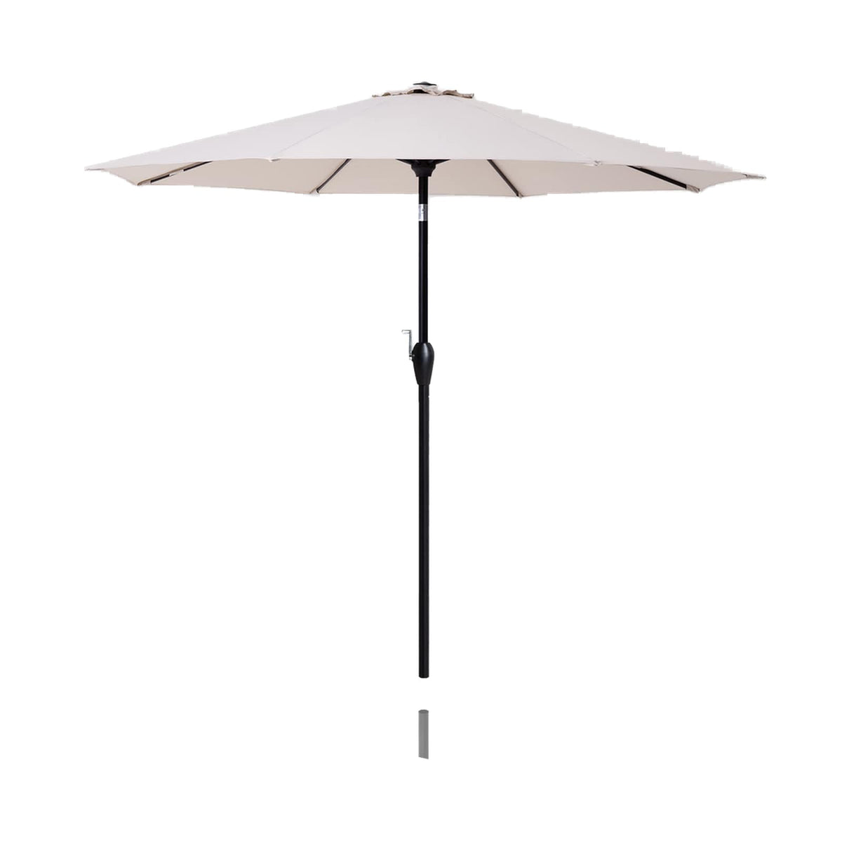 Tempera 9ft patio umbrella shading outdoor dining area.