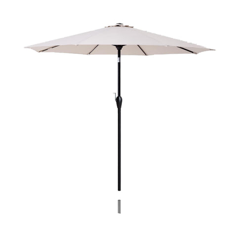 Tempera 9ft patio umbrella shading outdoor dining area.