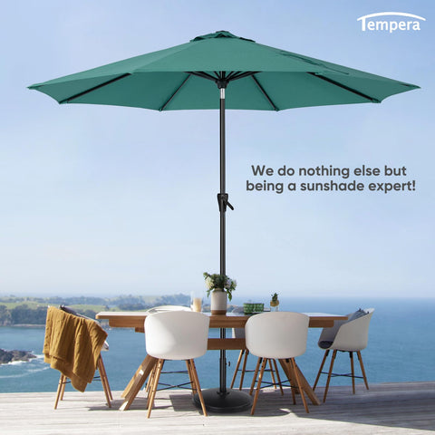 Tempera outdoor dining setup provides comfortable shade for gatherings.