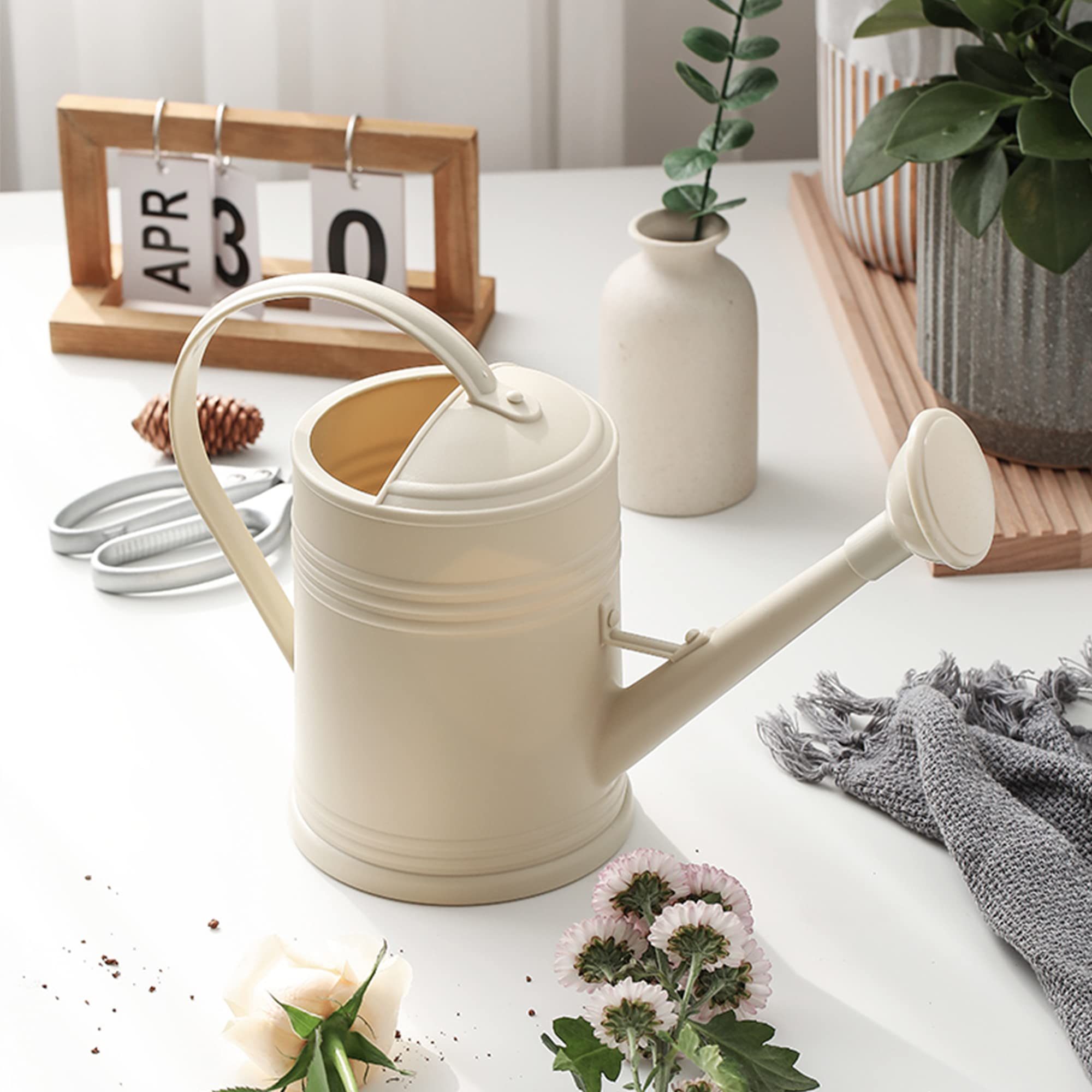 Tennedriv Green 68 oz watering can covers multiple plants between refills.
