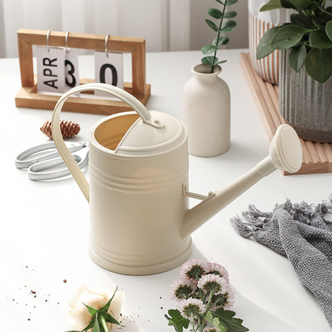 Tennedriv Green 68 oz watering can covers multiple plants between refills.