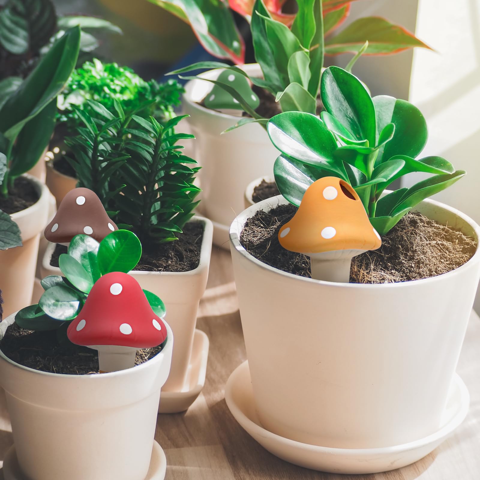 Mushroom-shaped watering globe visible in a pot enhances hydration for indoor plants.