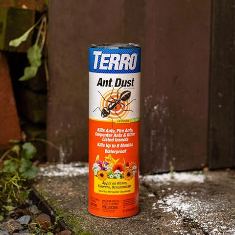 Terro Ant Dust being applied along a baseboard crack to deter pests