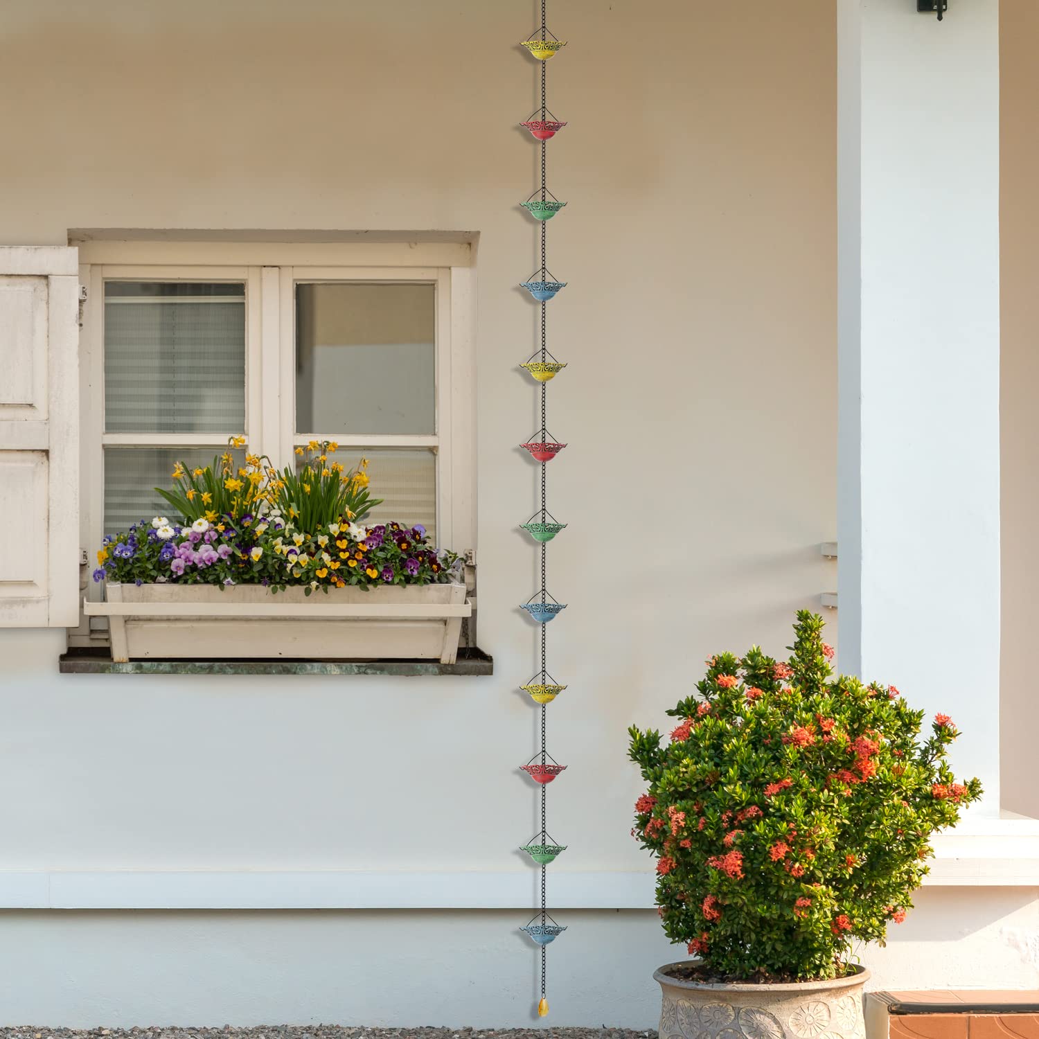 Cups and joints create gentle sounds reminiscent of a wind chime.