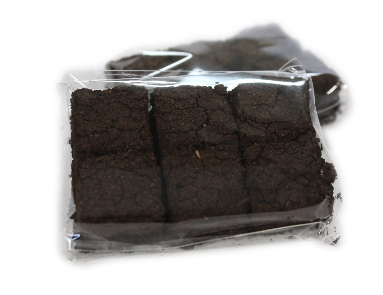 The Gifted Hand Irish Turf refill box—12 mini turf sods for authentic peat aroma.