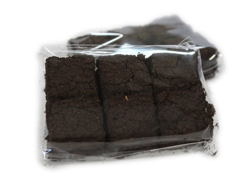 The Gifted Hand Irish Turf refill box—12 mini turf sods for authentic peat aroma.