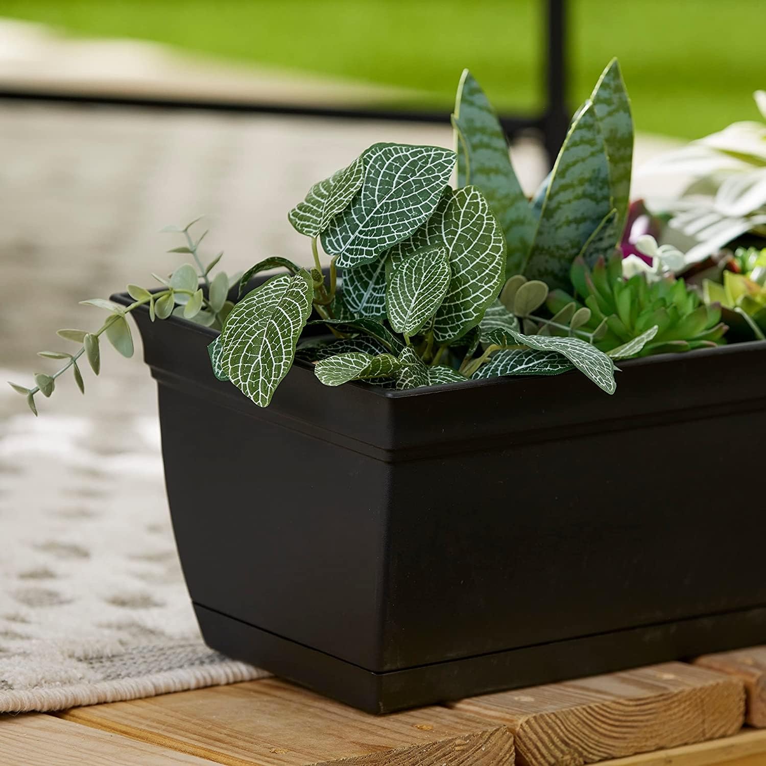 The HC Companies Eclipse window box closeup-saucer attachment emphasizes easy drainage.