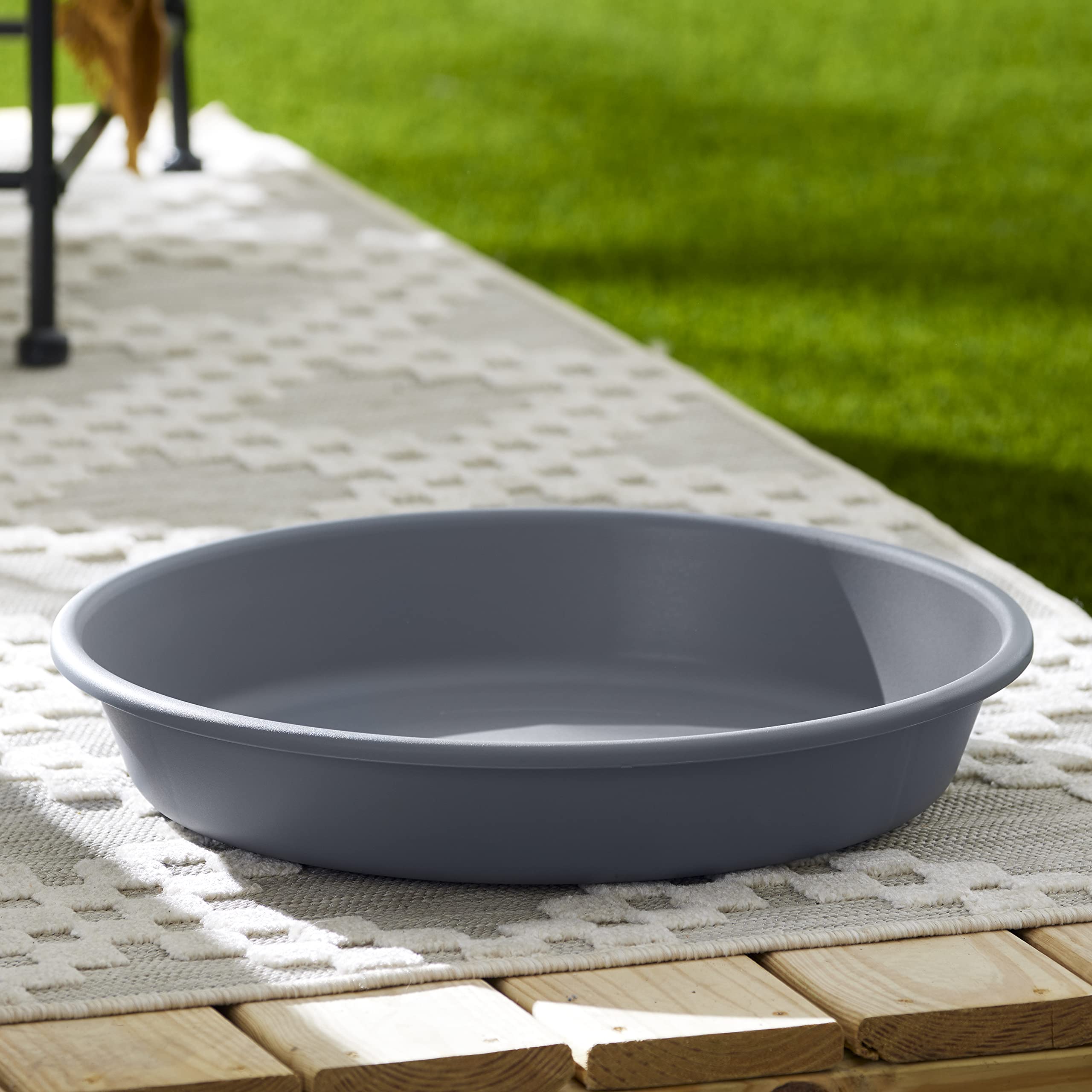 The HC Companies flower pot saucer outdoor setup shields floors from runoff.