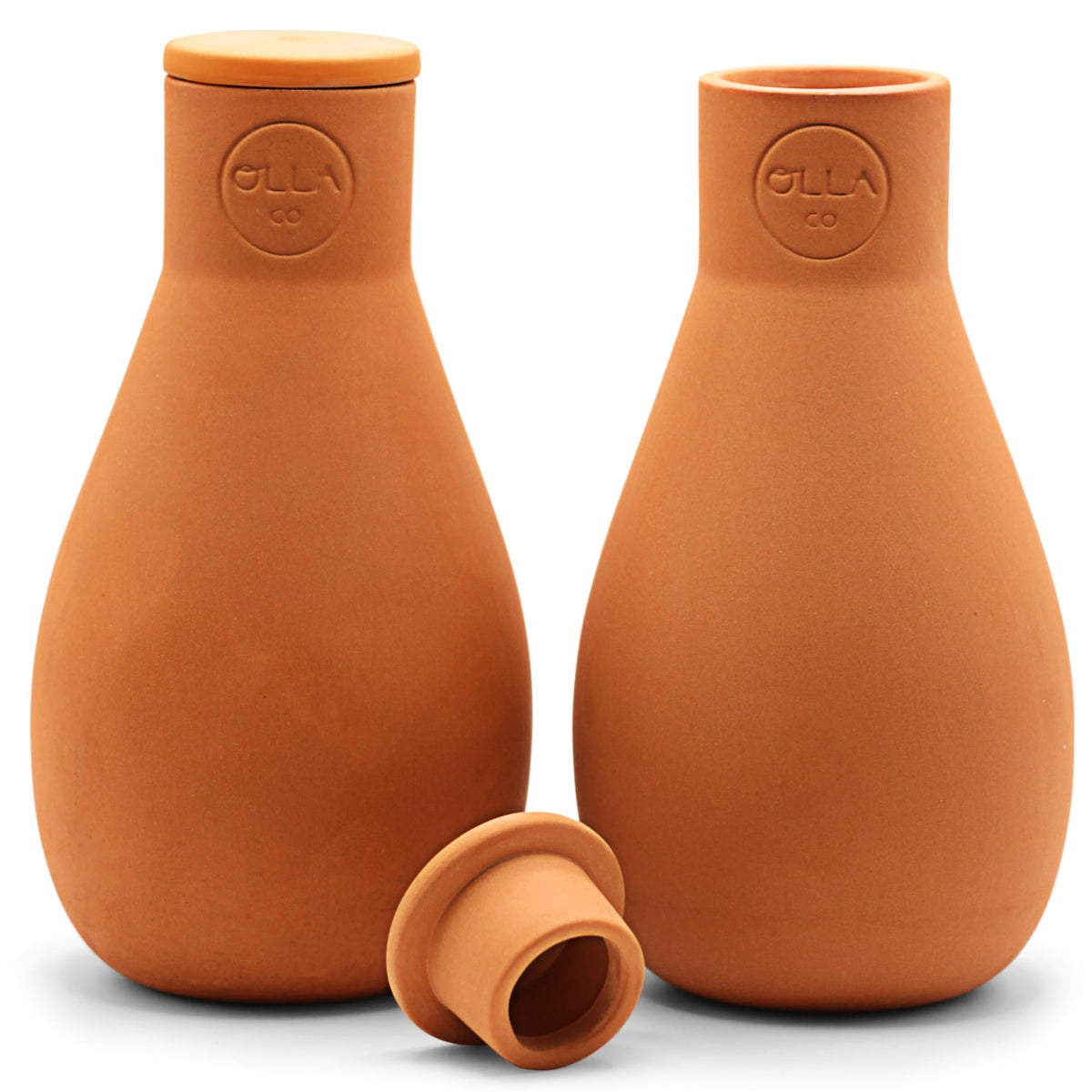 The Olla Company's classic olla pot with lid ready for garden irrigation