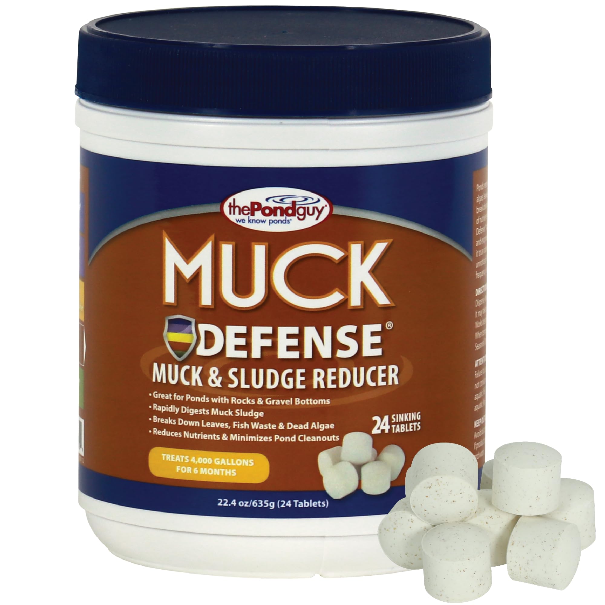 The Pond Guy Muck Defense tablets dissolving to digest pond sludge.