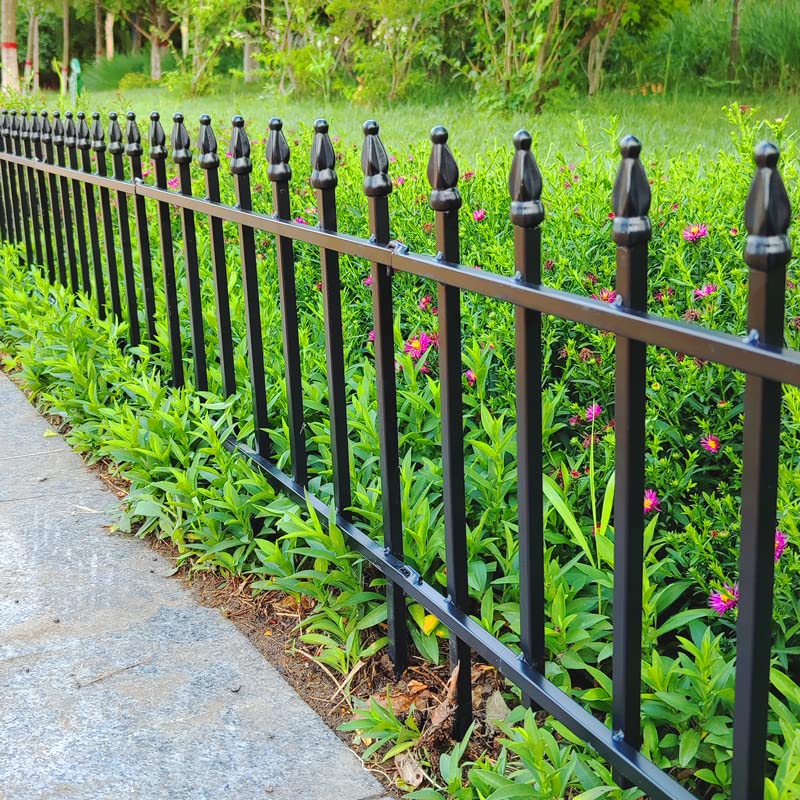 Thealyn metal decorative fence panel adds modern touch to a patio edge.