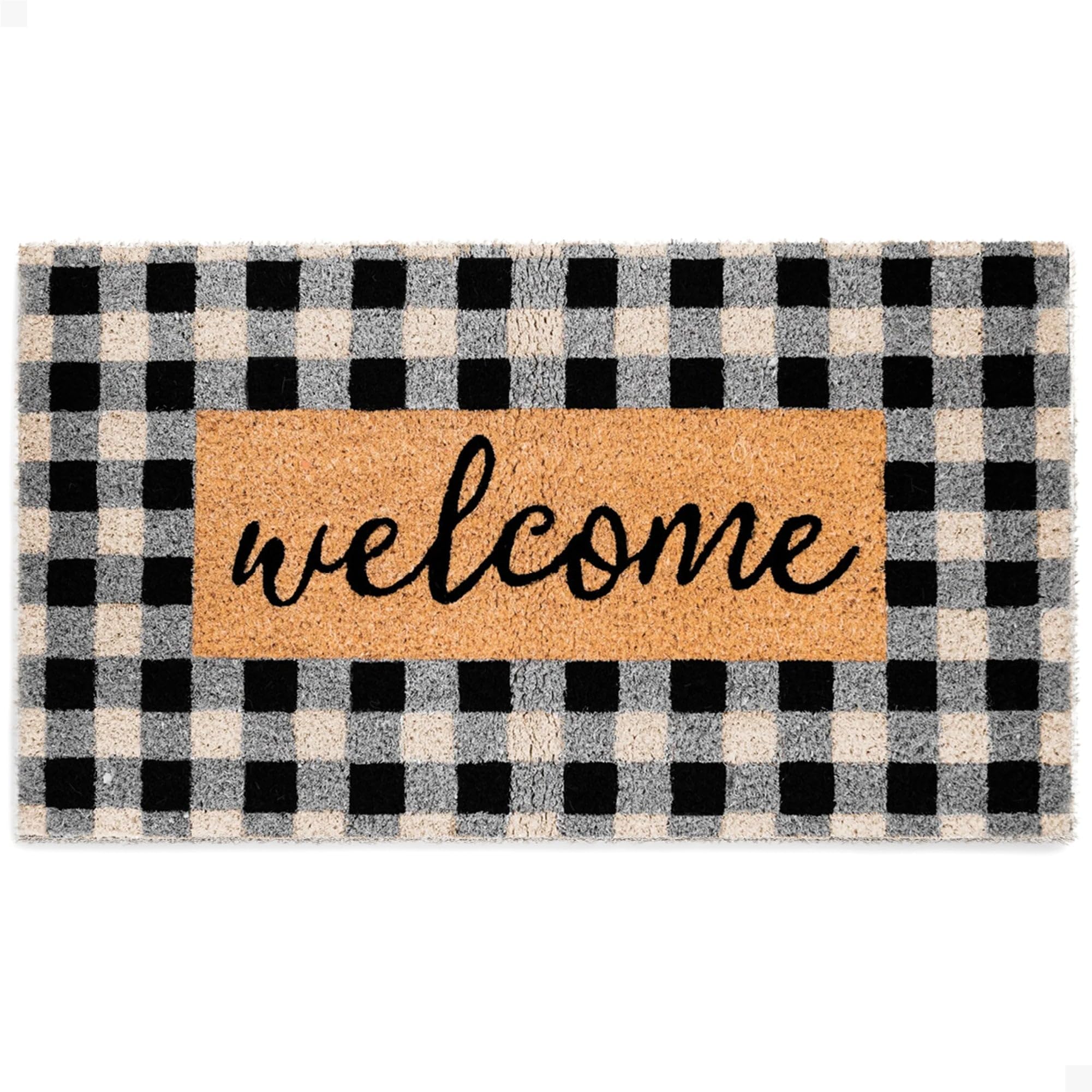 THEODORE MAGNUS buffalo check welcome mat enhances curb appeal while trapping dirt at the entry.