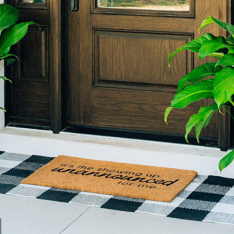 Theodore Magnus coir doormat combines durability with natural dirt-trapping fibers.