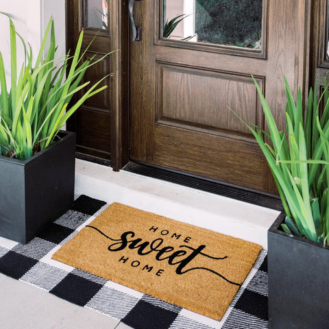 Theodore Magnus natural coir doormat reinforces durable dirt trapping.