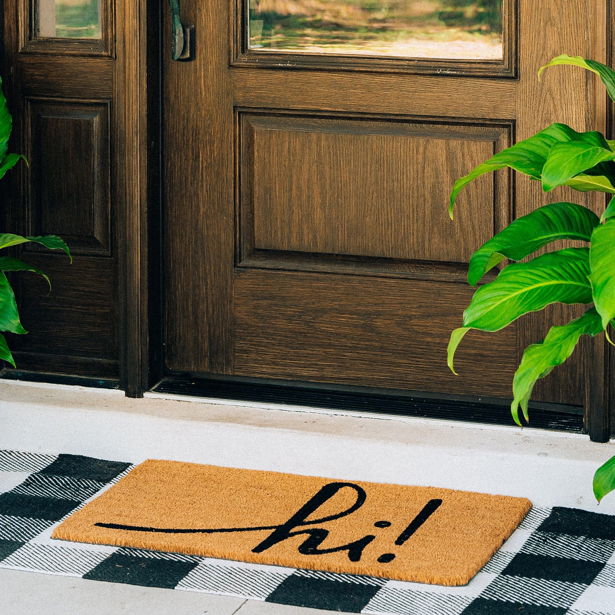 Theodore Magnus door mat non-slip back provides stable footing on wet days.