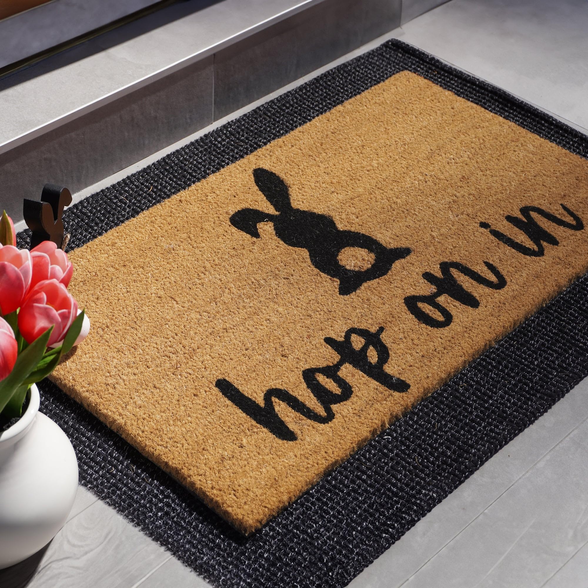 Close-up of anti-slip backing on Theodore Magnus Easter Doormat for stable footing.