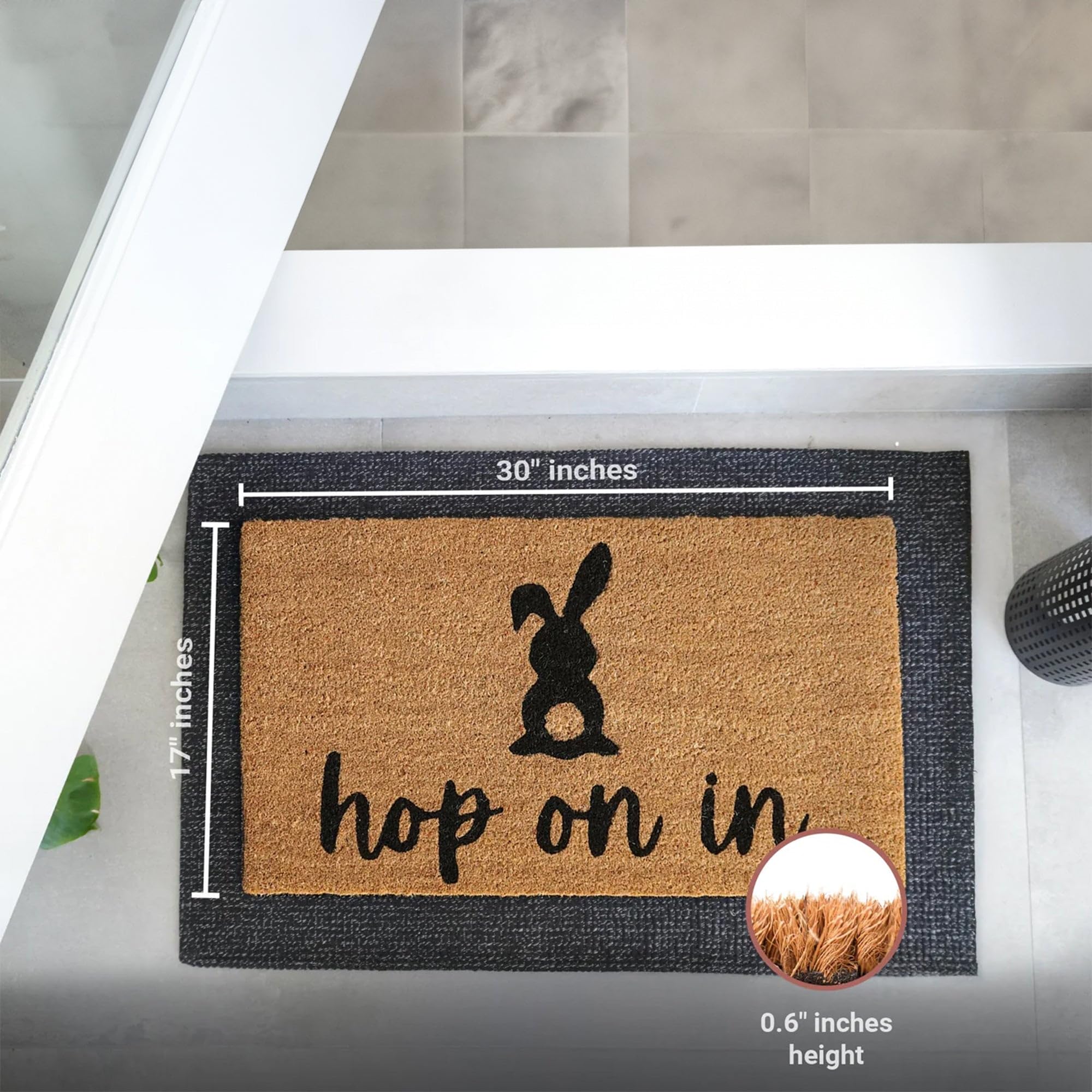Coir texture detail on Theodore Magnus Easter Doormat traps dirt effectively.