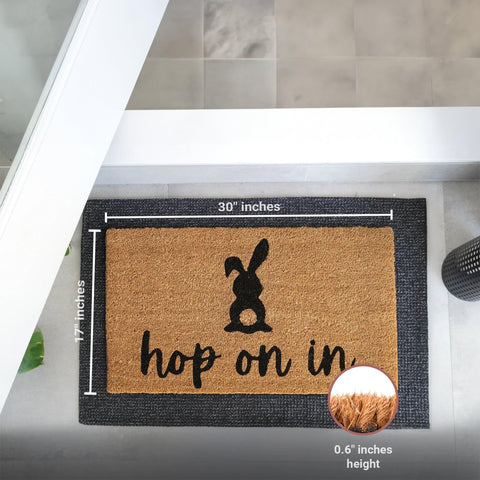 Coir texture detail on Theodore Magnus Easter Doormat traps dirt effectively.