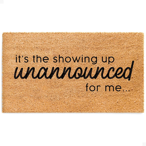 Theodore Magnus funny door mat with welcoming slogan and non-slip backing.