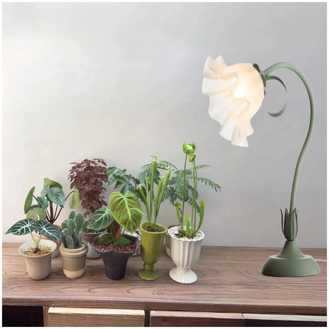 TheOneGrow table-top grow light over succulents on a compact desk for vibrant growth