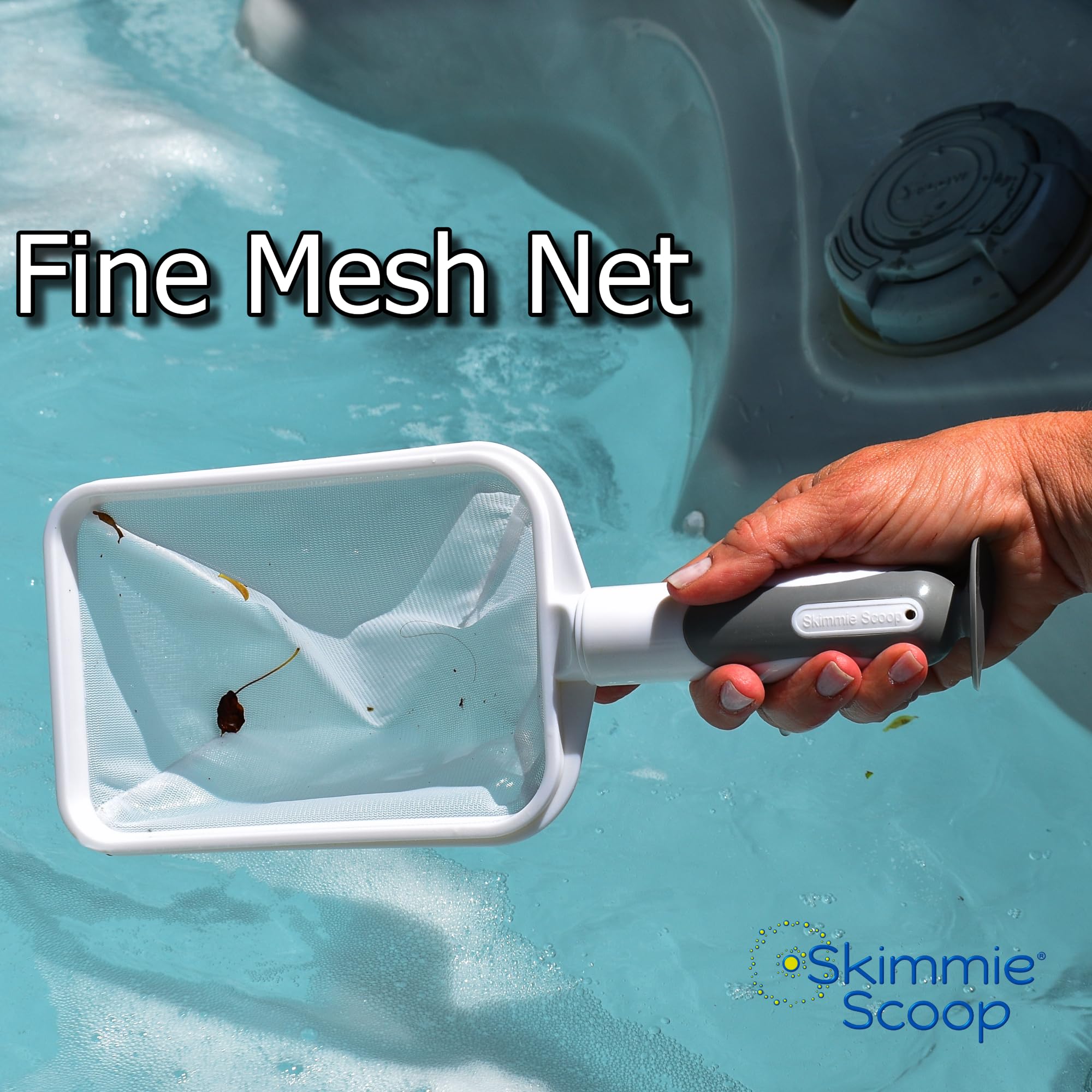 The Skimmie Scoop suction cup on handle enables hands-free wall attachment.
